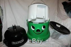 Boxed Numatic George is a wet/dry carpet cleaner with tools. Used once